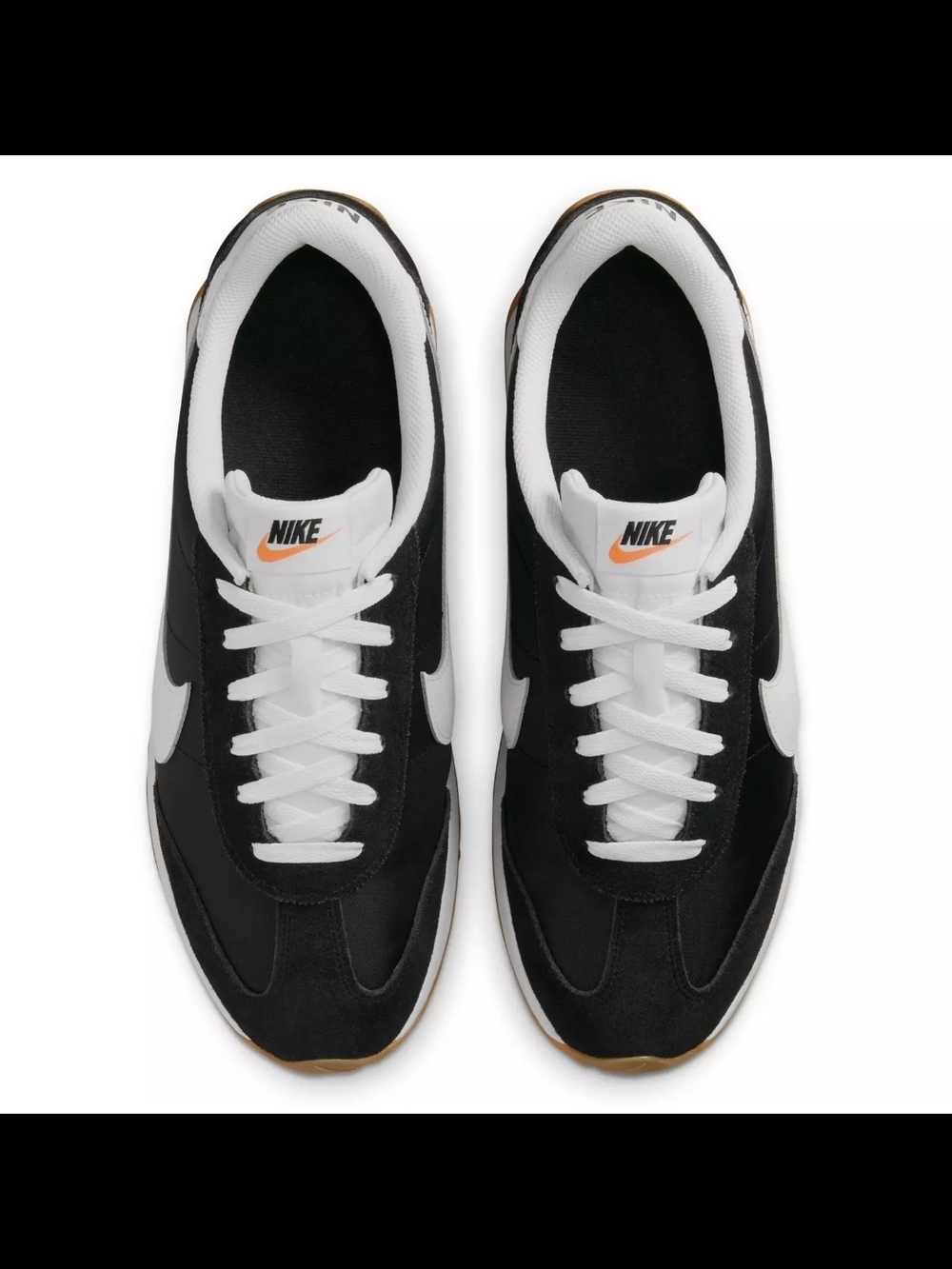 Nike Black and White Sneakers with Orange Logo
